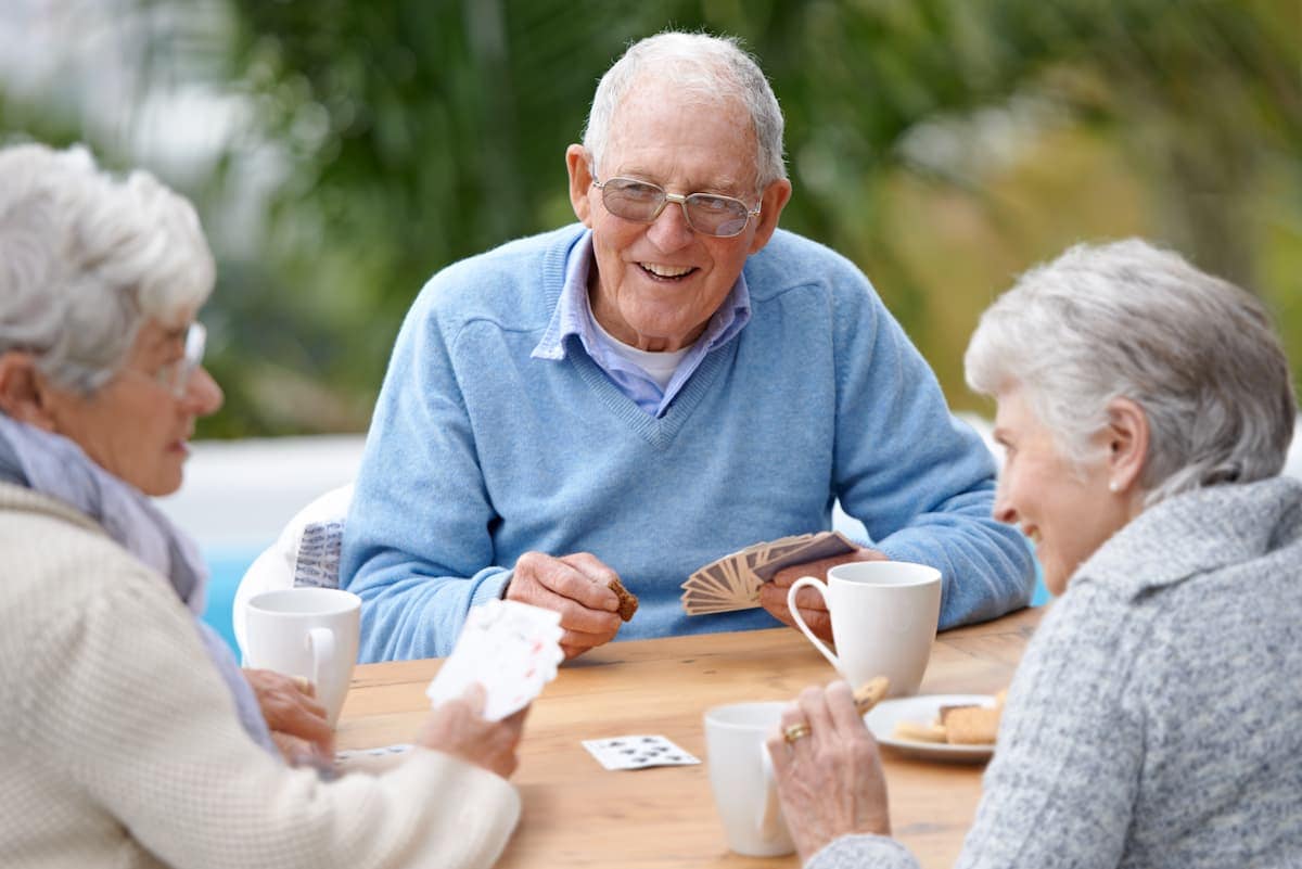 The Courtyard at Wyoming | Seniors playing cards